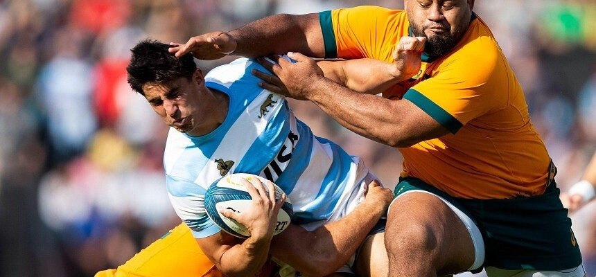 argentina centre lucio cinti is tackled by australia prop taniela tupou and centre hamish stewart photo afp