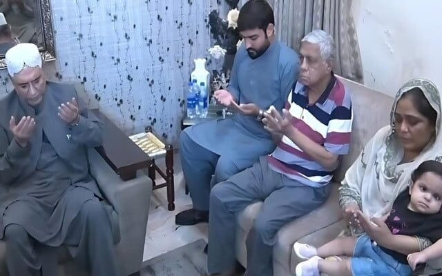 president zardari visiting the family of martyred captain muhammad ali qureshi in lahore on thursday screengrab